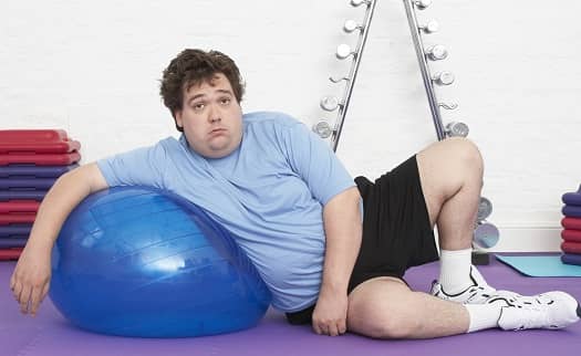 obese man working out