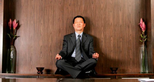 businessman-meditate-in-office
